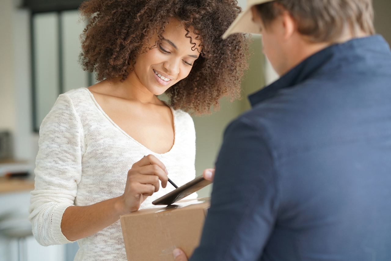 Woman accepting a delivery